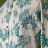 Off white cotton kurta set for women with teal floral print front view
